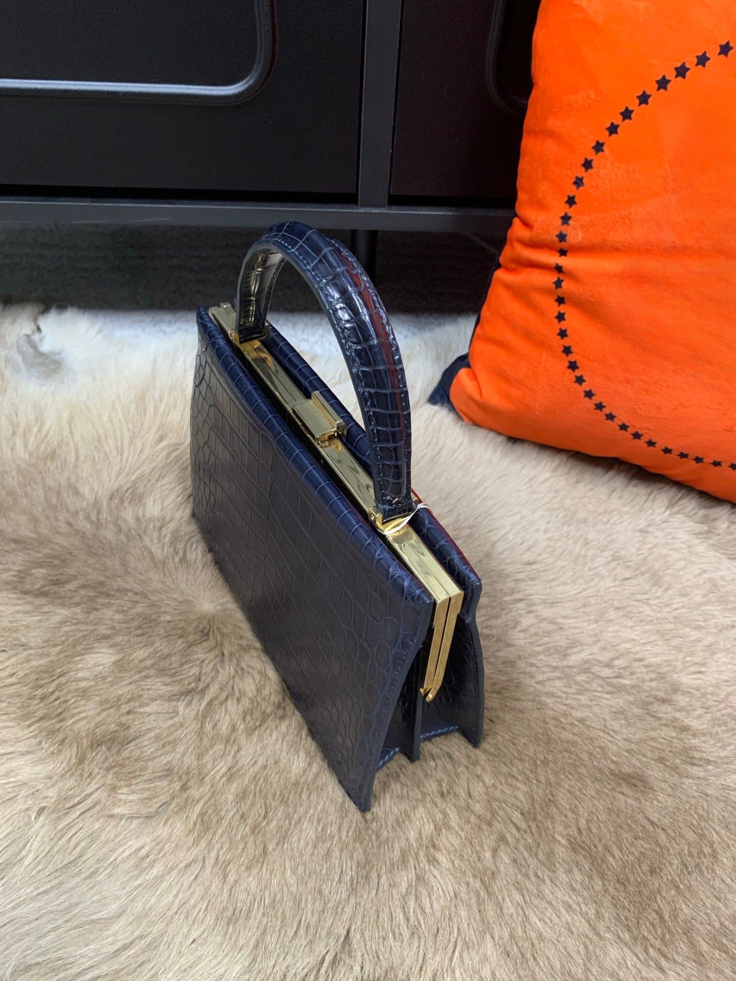 Rossie Viren crocodile leather evening clutch bag with top handle, elegant design, perfect for formal occasions.