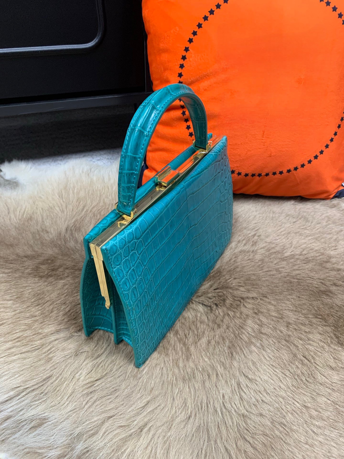 Rossie Viren crocodile leather evening clutch purse with top handle, black handbag for elegant occasions.