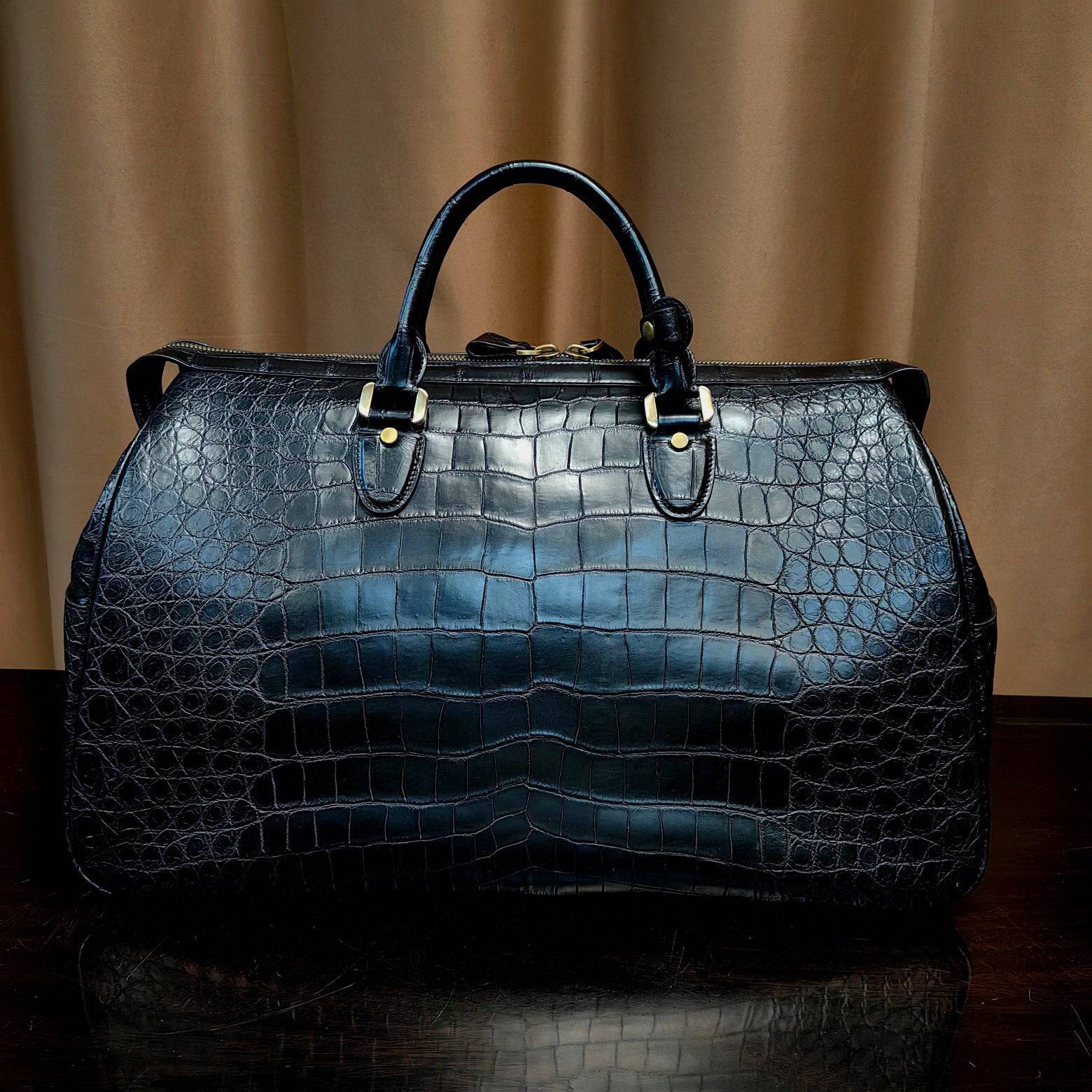 Genuine crocodile leather Rossie Viren Super XL travel duffel bag with sturdy handles and spacious interior.