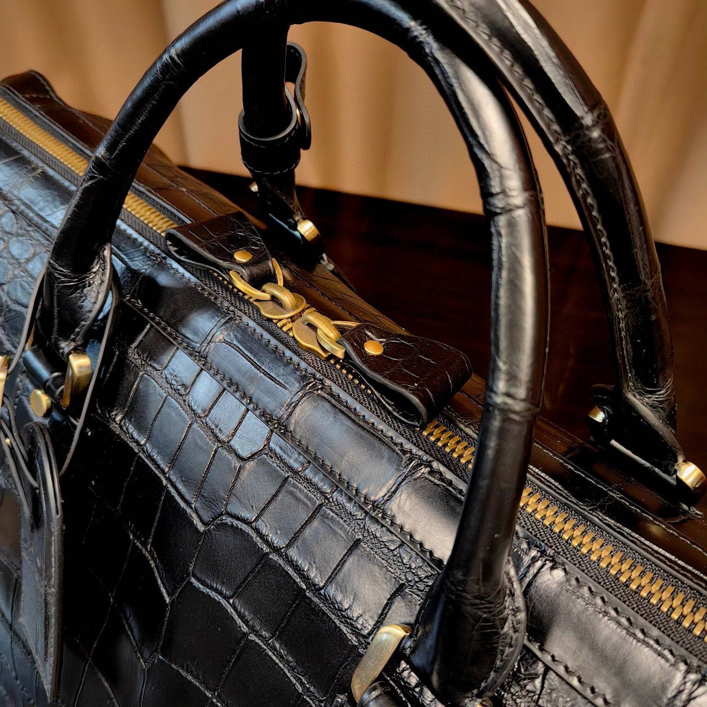 Genuine crocodile leather super XL travel duffel bag by Rossie Viren, showing the textured crocodile pattern and large size.