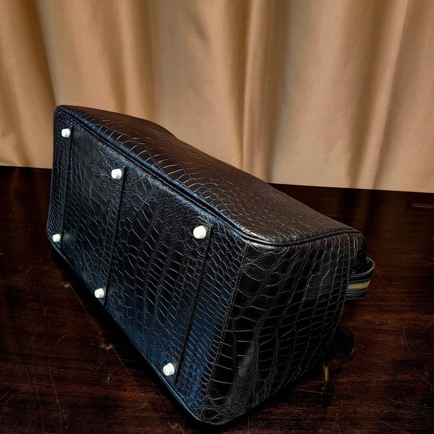 Genuine crocodile leather Super XL travel duffel bag by Rossie Viren with sturdy handles and spacious design.