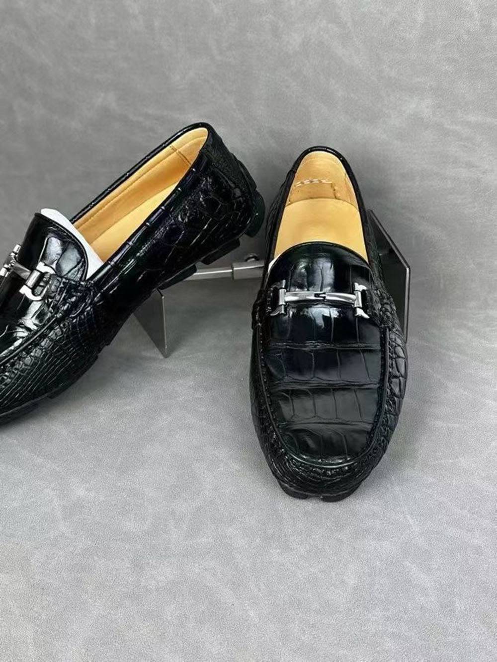 Black crocodile leather men's penny loafer dress shoe by Rossie Viren, featuring a sleek, polished leather design.