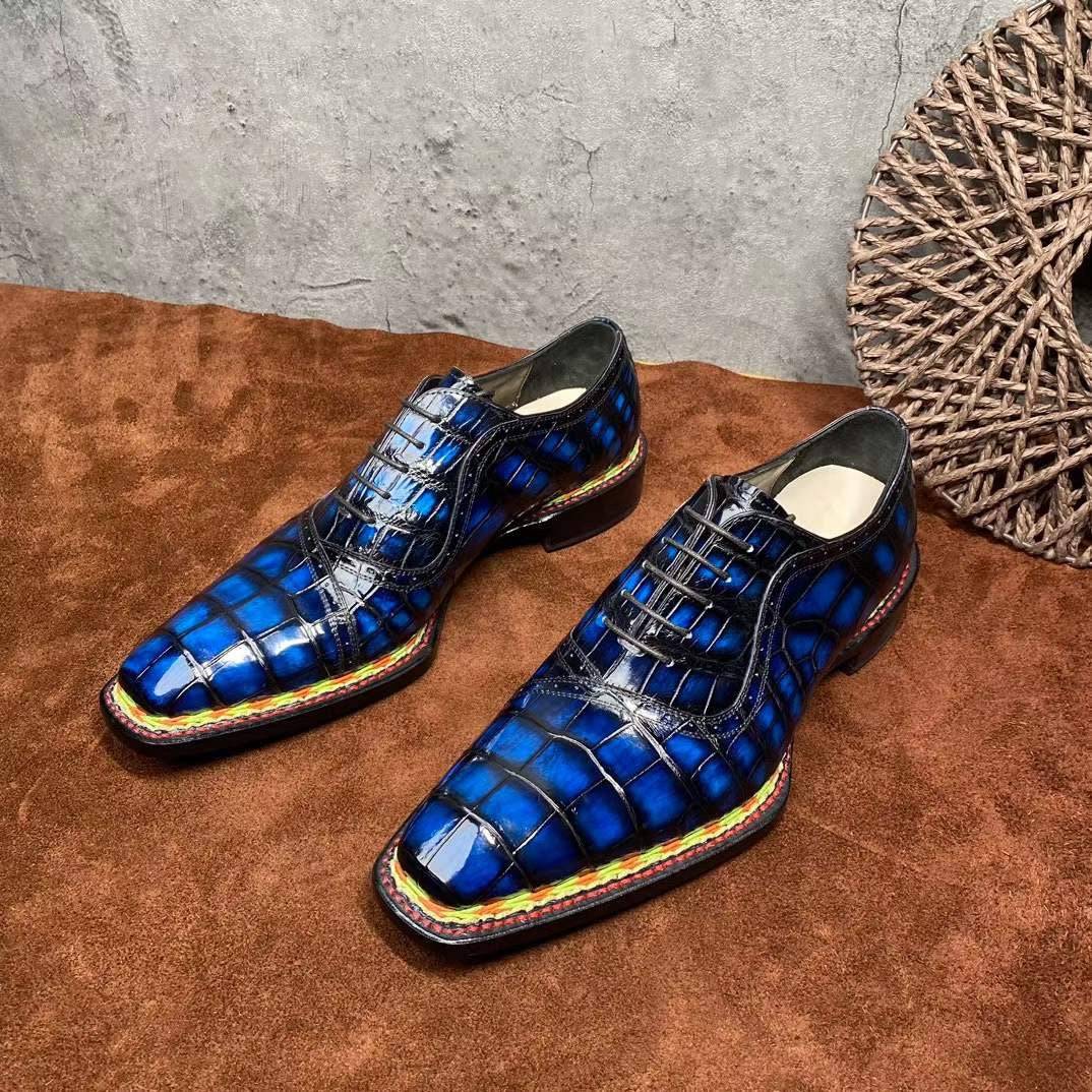 Vintage blue Rossie Viren crocodile leather men's dress shoes with Norwegian stitching and lace-up design.
