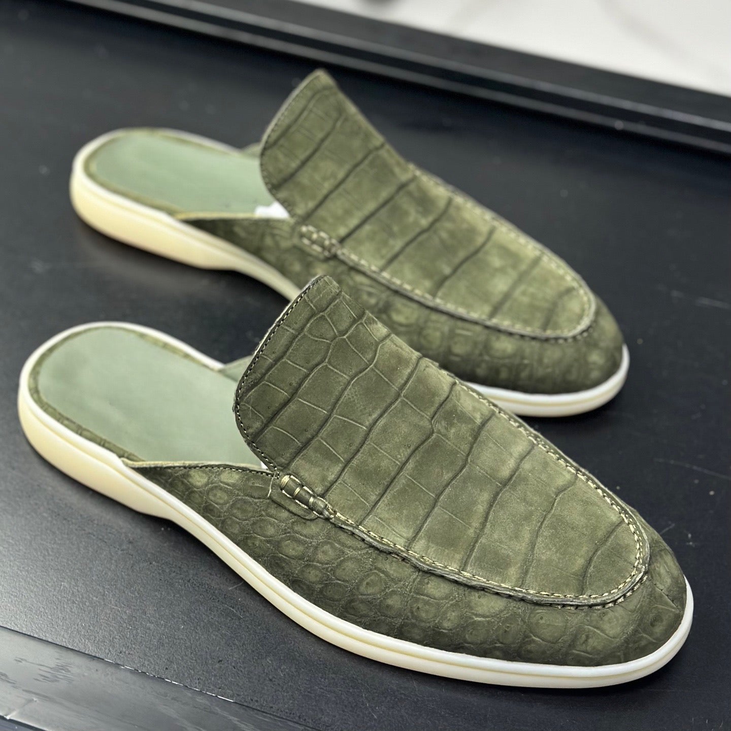 Rossie Viren men's croc leather slippers made of nubuck crocodile leather, featuring a comfortable slip-on shoe design.
