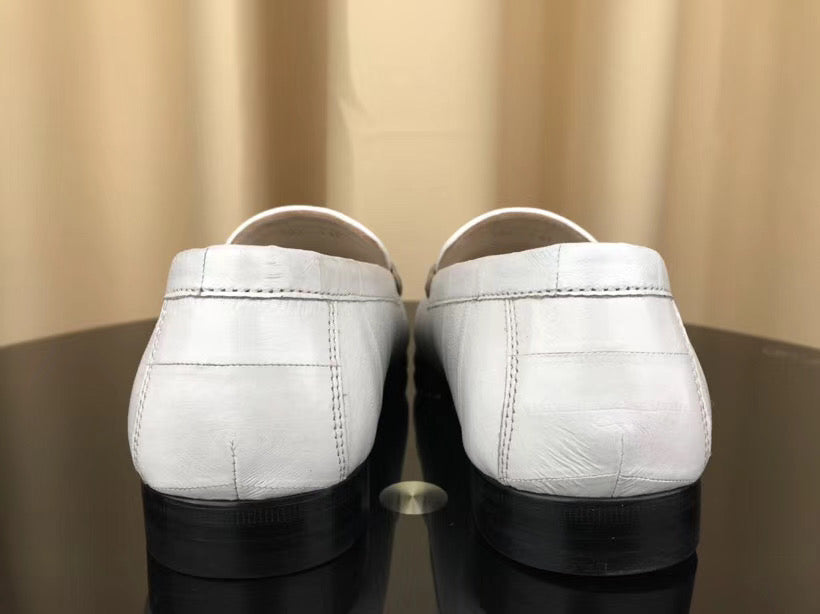 Men's white eel skin leather loafers by Rossie Viren, soft and stylish shoes with a sleek design.