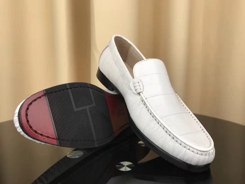 Men's white eel skin leather loafers by Rossie Viren, showcasing soft, smooth texture and classic slip-on design.
