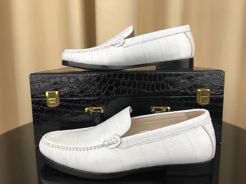 Men's white eel skin leather loafers by Rossie Viren, showcasing soft, sleek men's shoes with smooth leather texture.