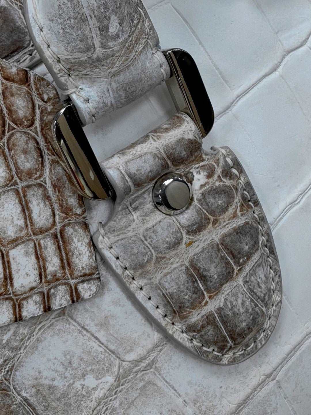 Unisex Himalayan genuine crocodile leather travel duffel bag by Rossie Viren, oversized sport gym bag with handles and leather details.