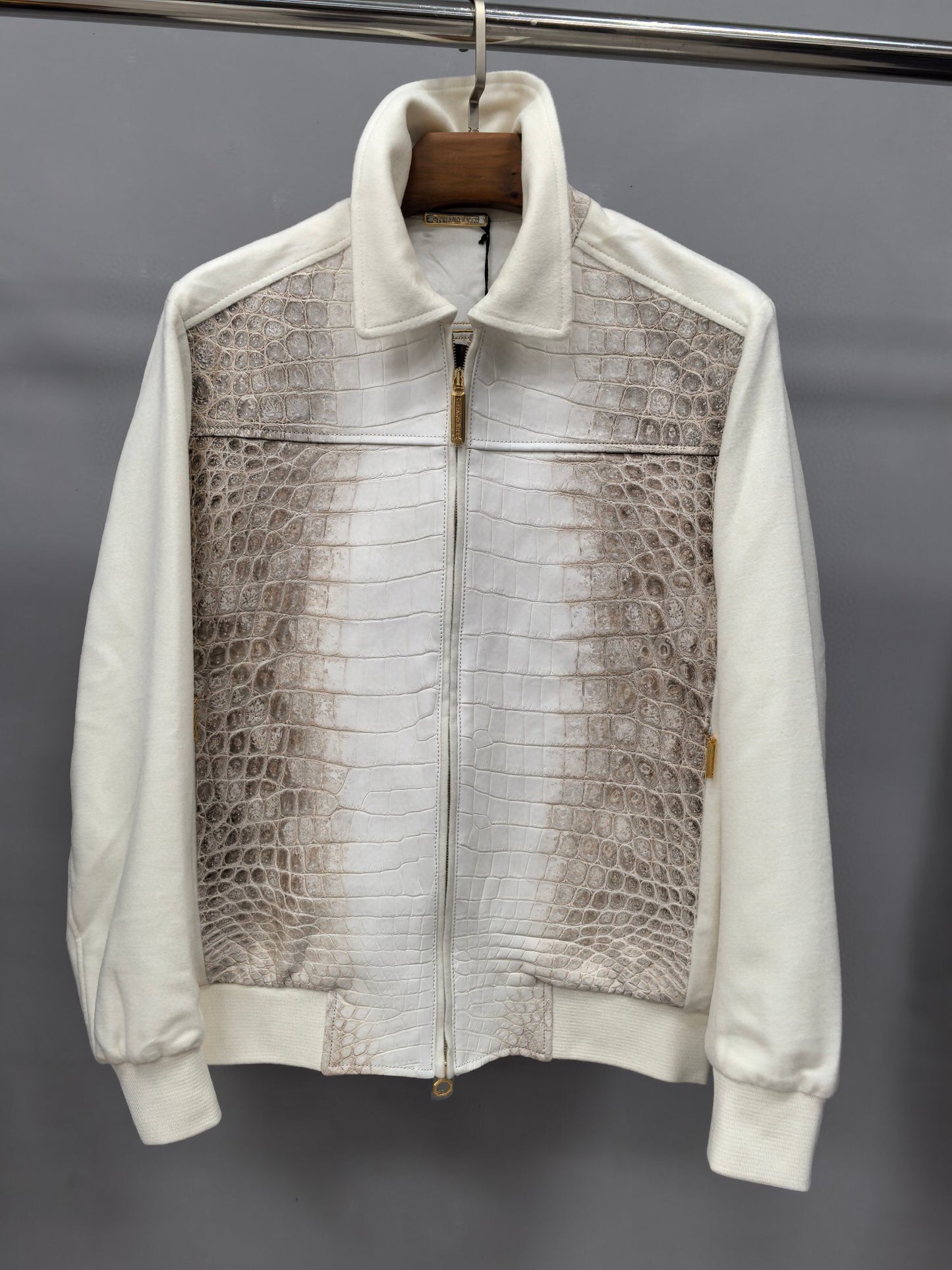Himalaya white crocodile leather jacket by Rossie Viren featuring wool accents and a sleek, luxurious design.