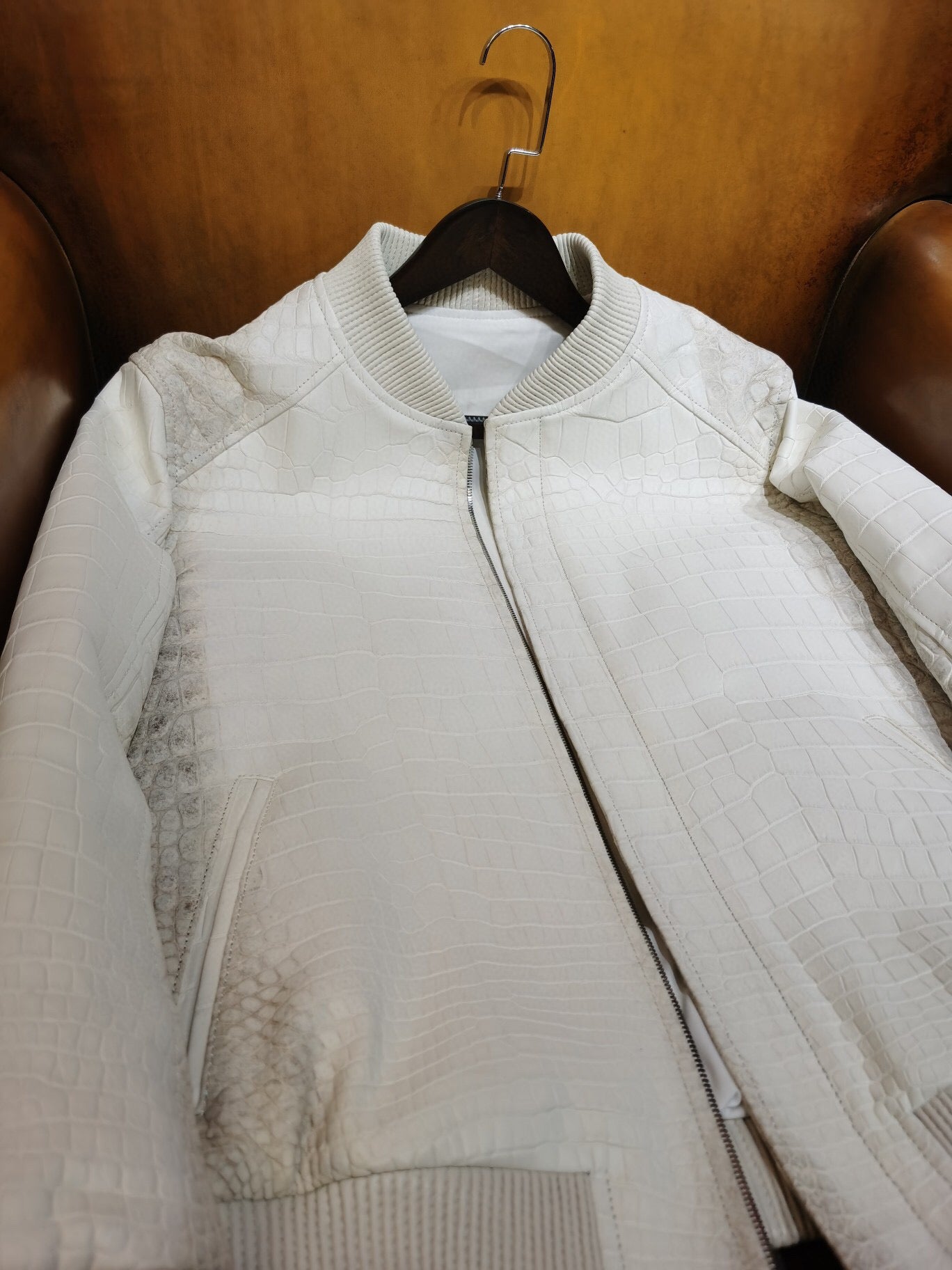 Himalaya white crocodile leather jacket with wool lining by Rossie Viren, featuring textured crocodile skin and stylish design.