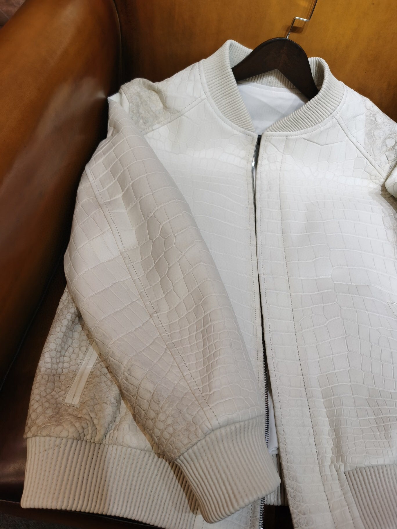 Himalaya white crocodile leather jacket by Rossie Viren featuring wool accents, stylish and luxurious outerwear design.