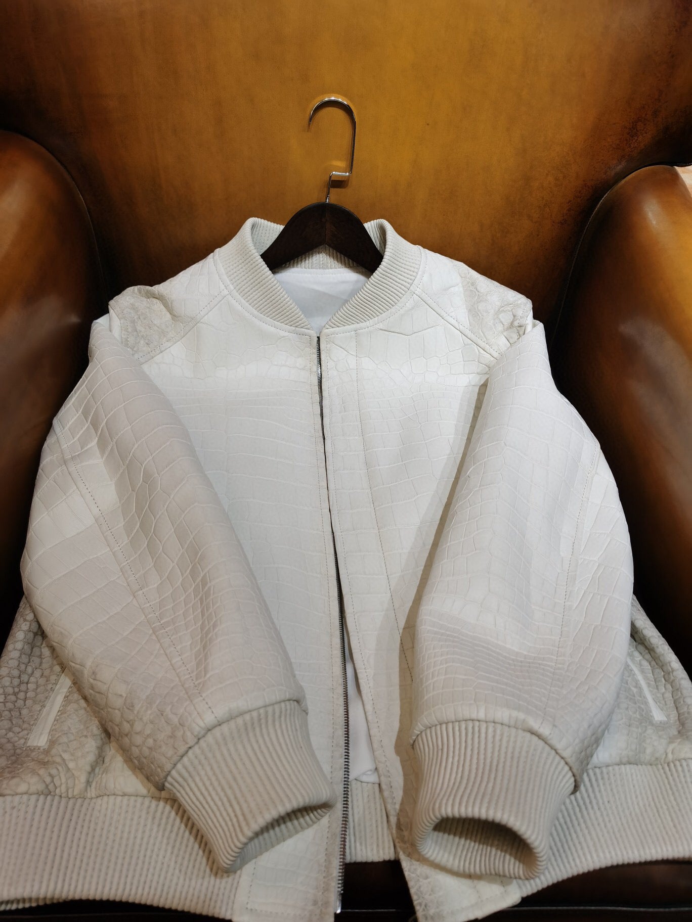 Himalaya white crocodile leather jacket by Rossie Viren featuring wool accents and a sleek, luxurious design.