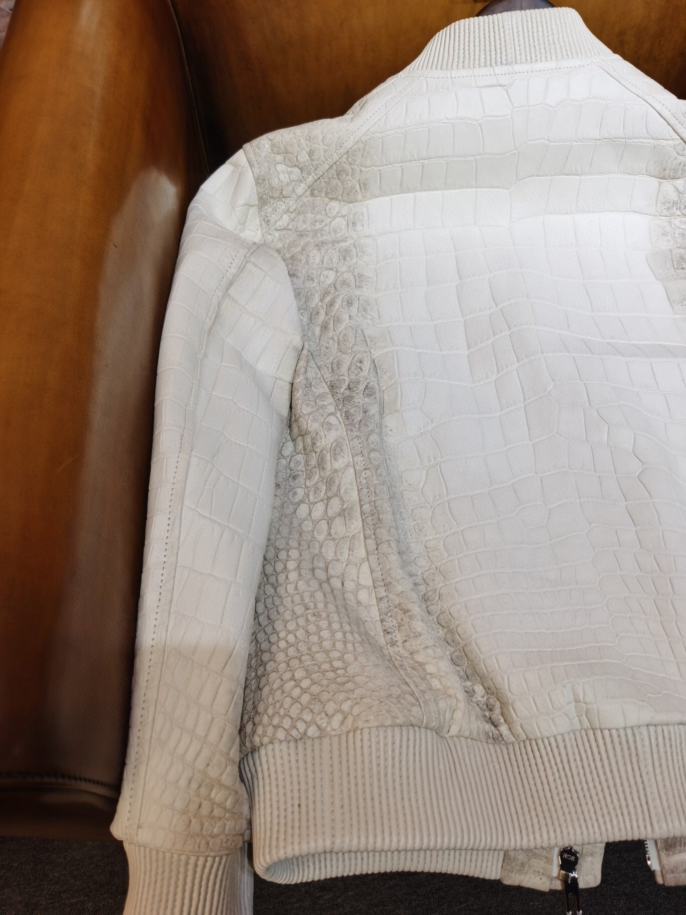 Himalaya white crocodile leather jacket by Rossie Viren with wool lining, stylish and luxurious outerwear for cold weather.