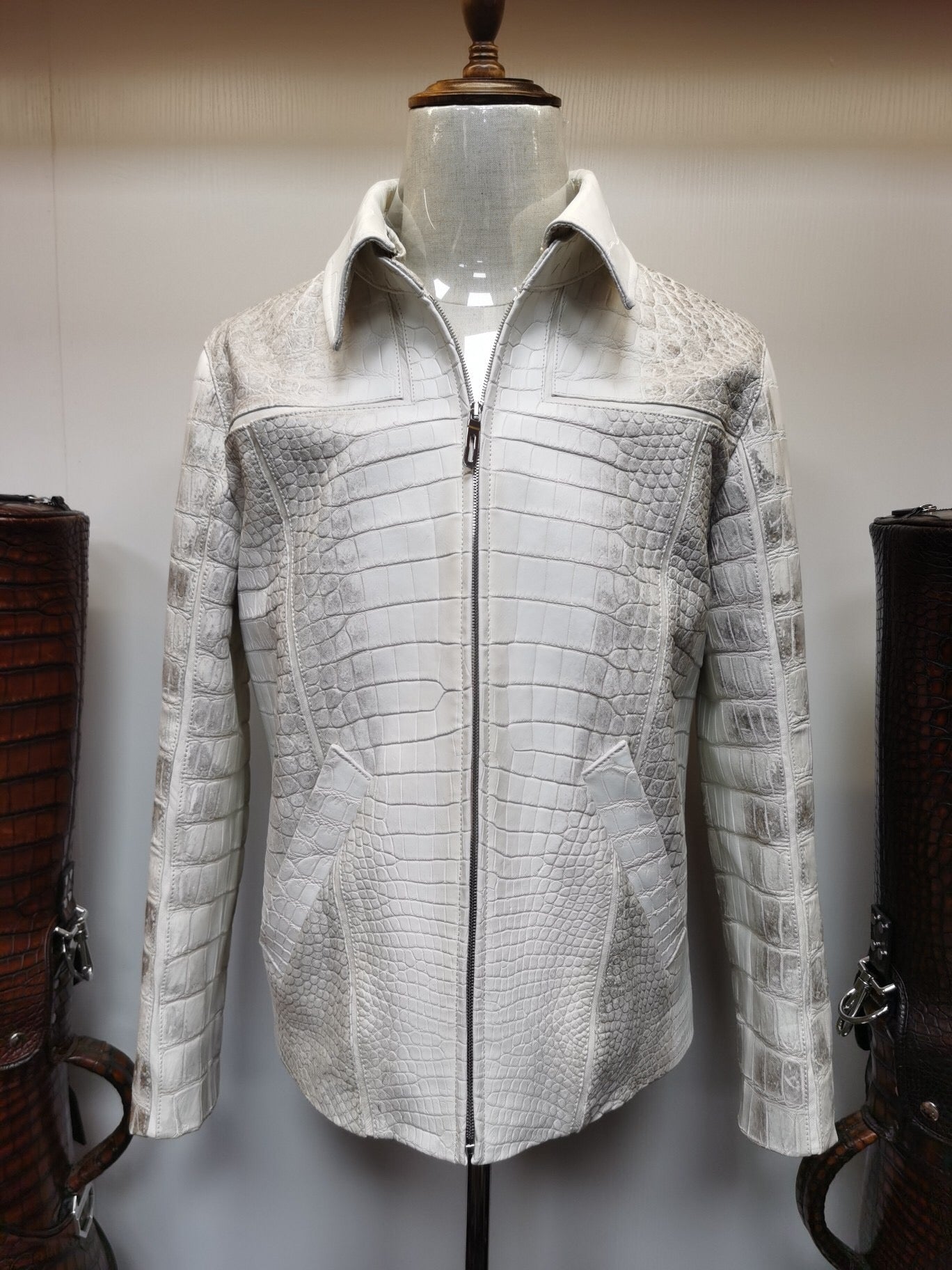 Himalaya white crocodile leather zip-up jacket by Rossie Viren, featuring a sleek design and textured crocodile skin.