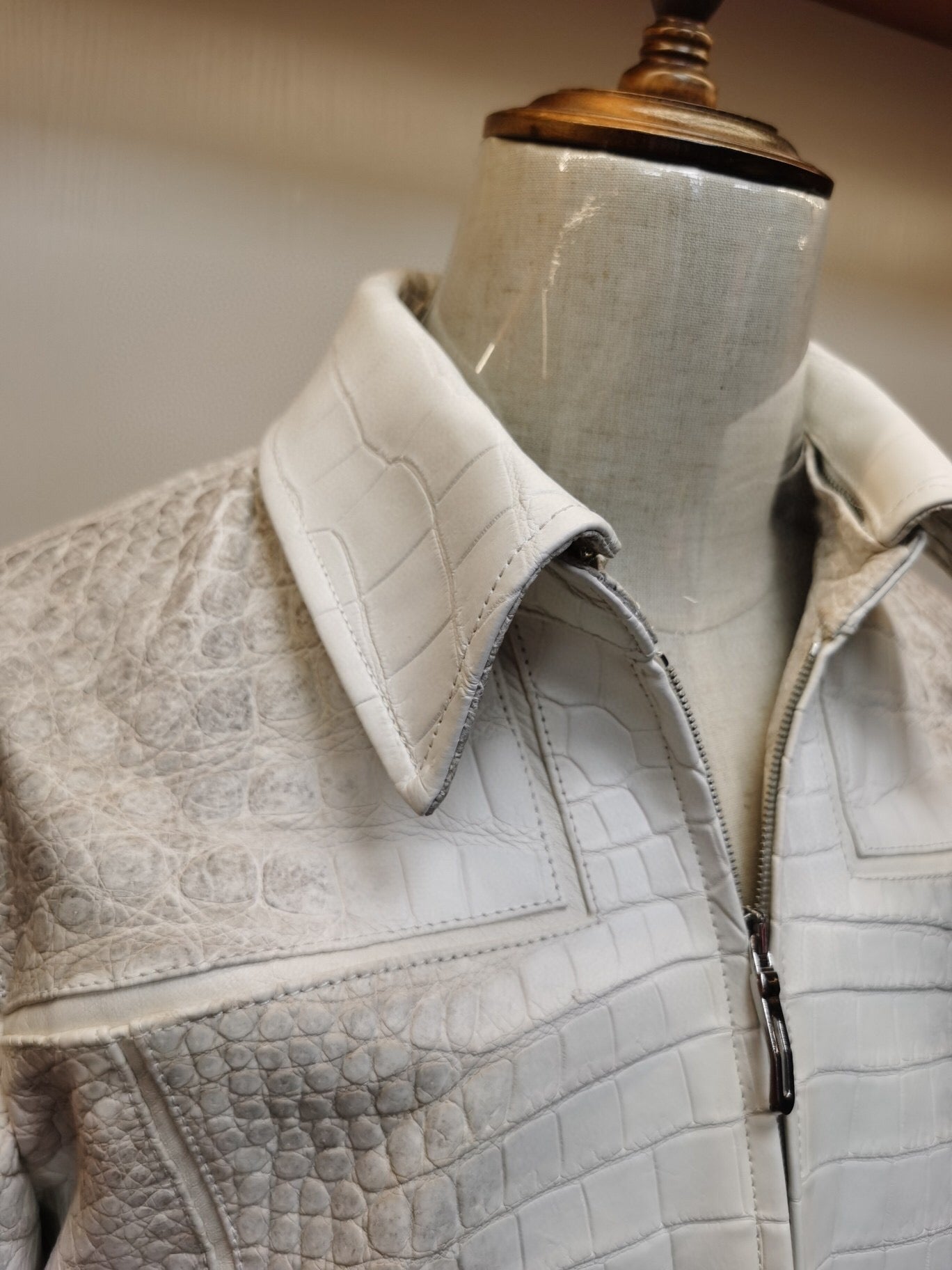 Himalaya white crocodile leather zip-up jacket by Rossie Viren, featuring a sleek, textured crocodile pattern and tailored fit.