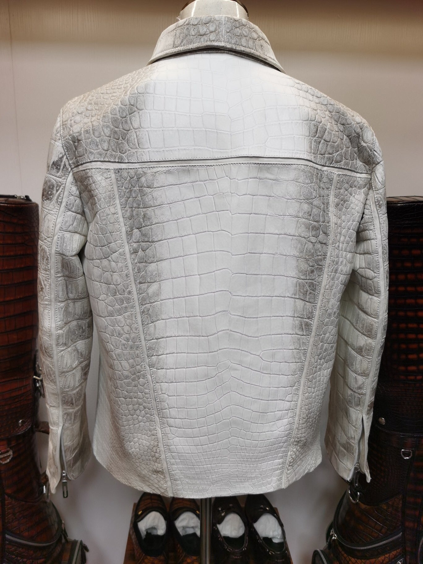 Himalaya white crocodile leather zip-up jacket by Rossie Viren, featuring textured crocodile skin and a sleek, tailored fit.