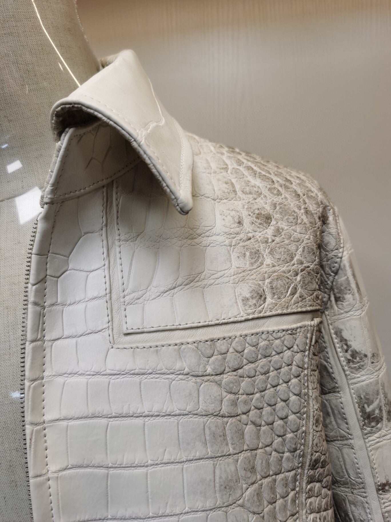 Himalaya white crocodile leather zip-up jacket by Rossie Viren, featuring textured crocodile skin and a sleek, fitted design.