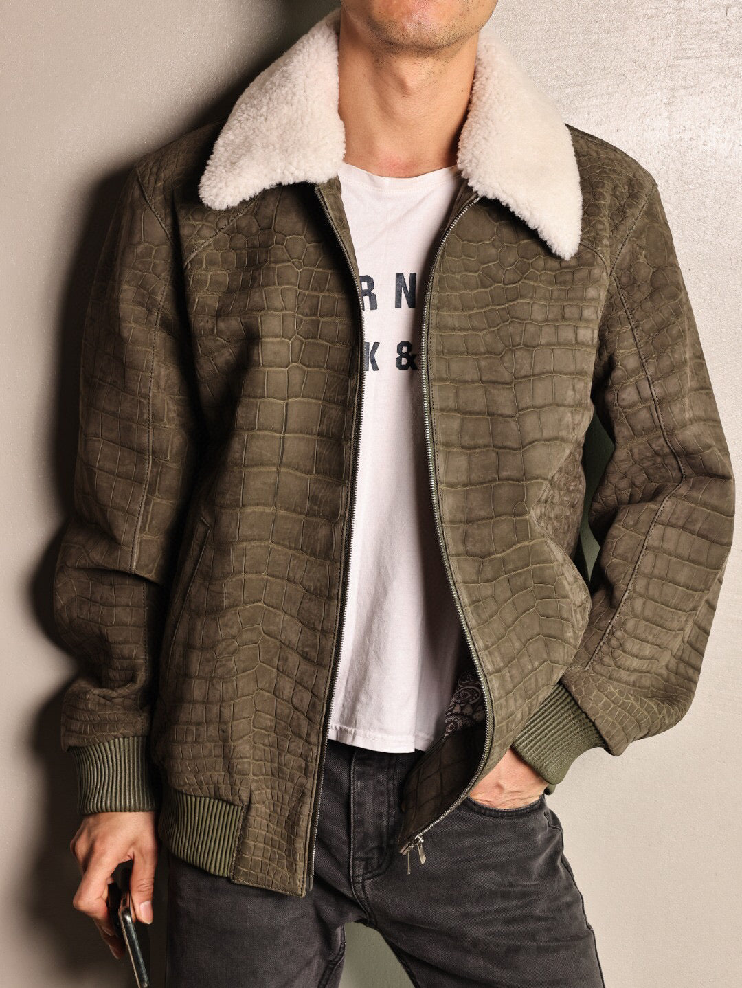 Green crocodile leather jacket with wool collar and zip-up front, casual coat by Rossie Viren.