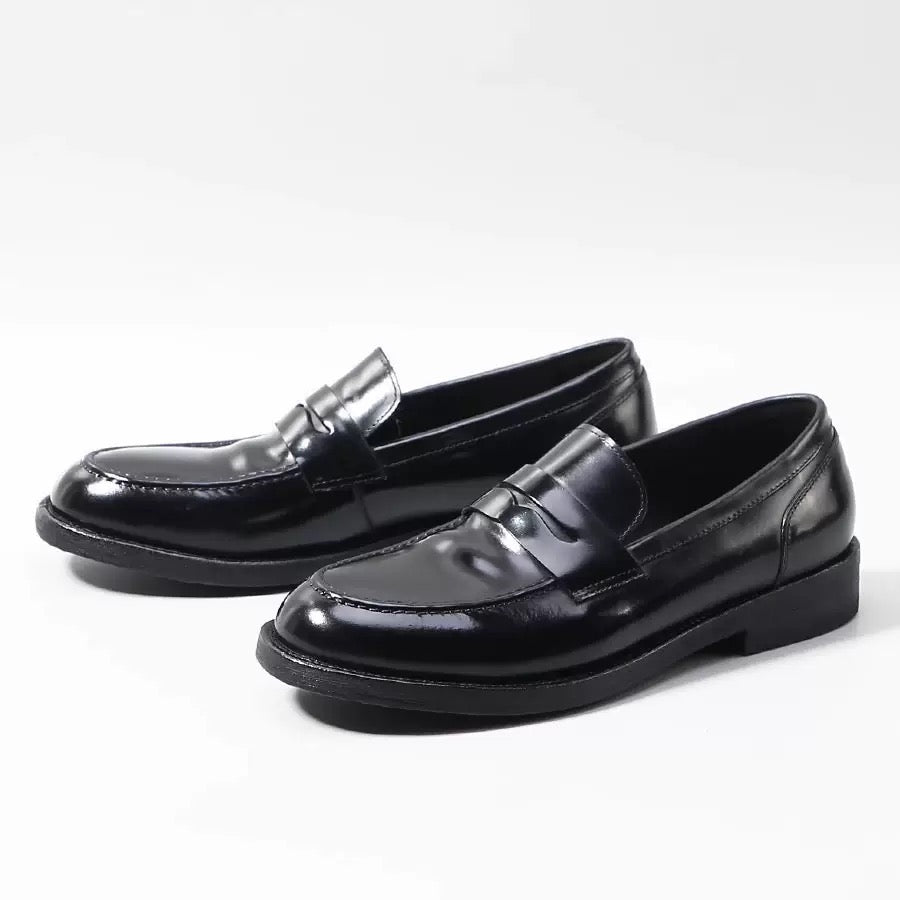 Rossie Viren genuine shell cordovan leather loafer with round toe, showcasing polished finish and classic shoe design.
