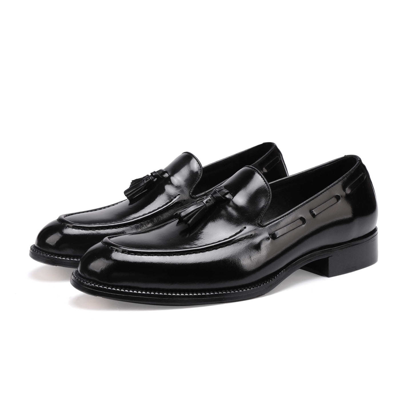 Genuine Shell Cordovan leather loafer shoes with tassels by Rossie Viren, showcasing polished leather and classic design.