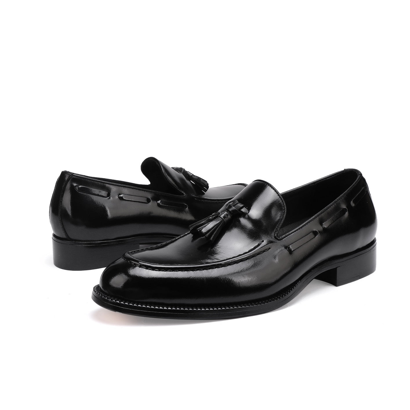 Genuine Shell Cordovan leather loafer shoes with tassels by Rossie Viren, featuring sleek design and polished finish.