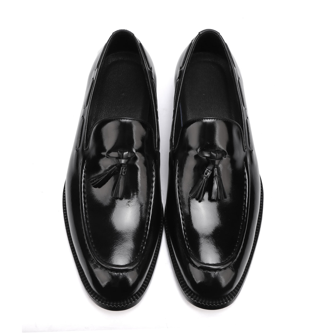 Genuine Shell Cordovan leather loafer shoes with tassels by Rossie Viren, featuring polished finish and classic slip-on design.