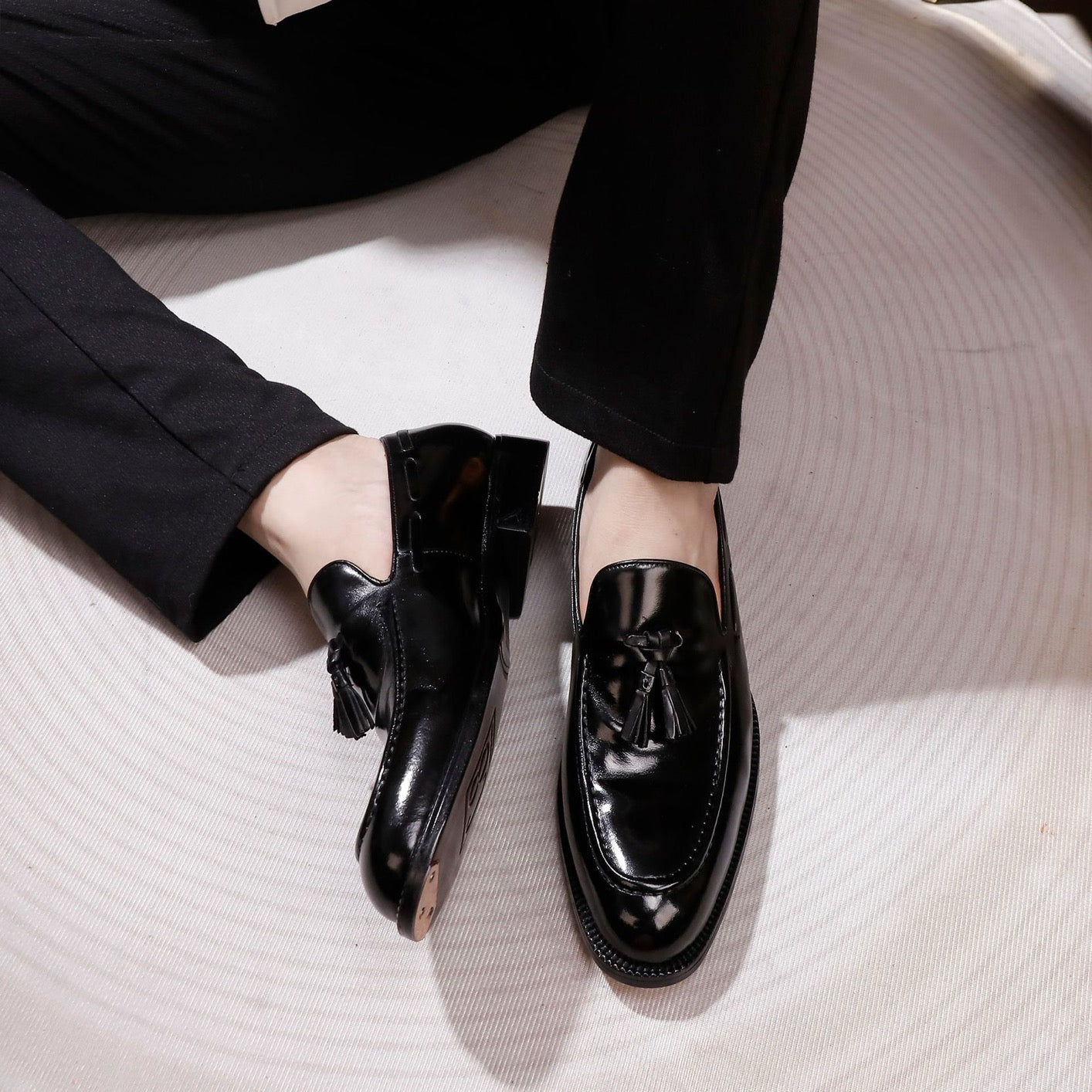 Genuine shell cordovan leather loafer shoes with tassels by Rossie Viren, featuring a polished finish and classic design.