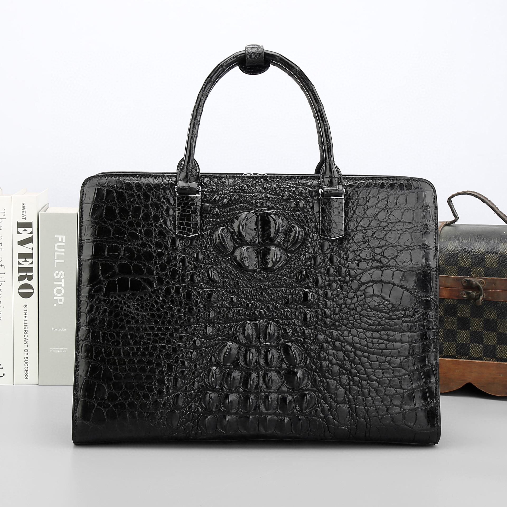 Genuine crocodile leather Rossie Viren business briefcase with sturdy handles and polished finish, designed for professional use.