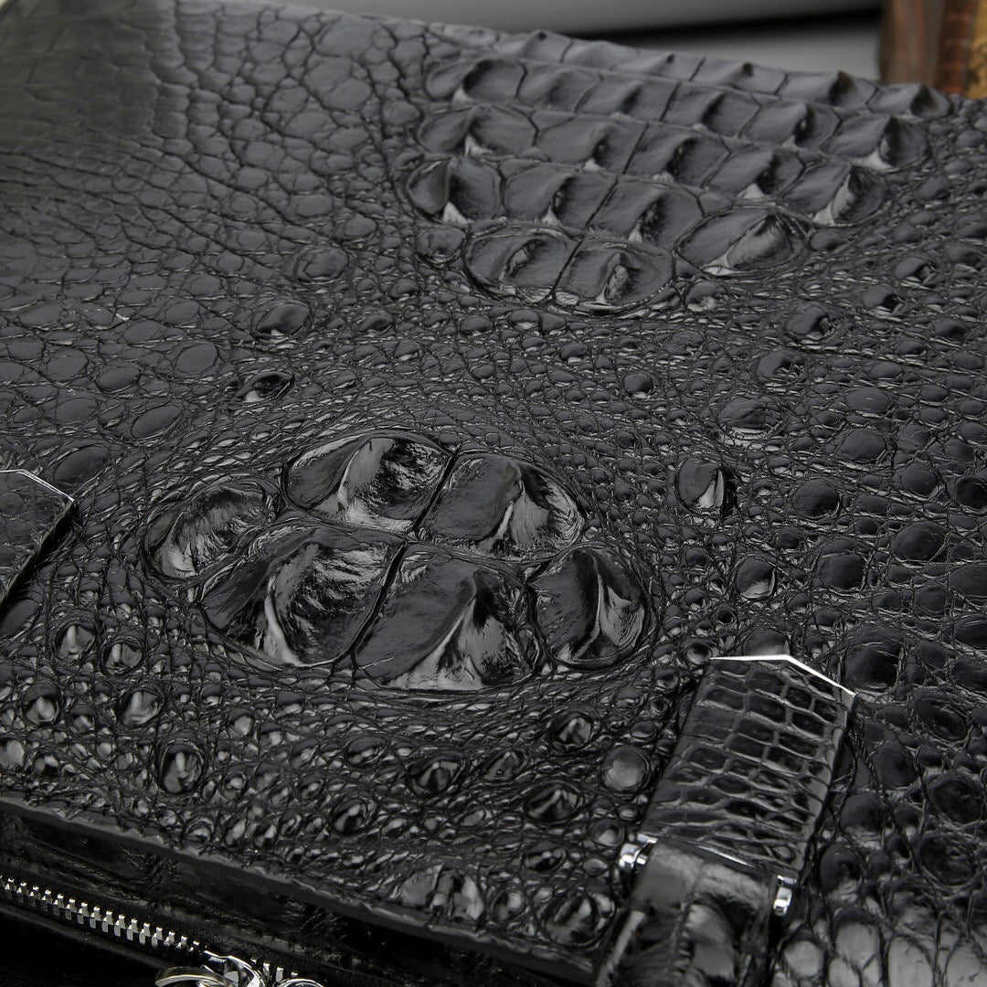 Genuine crocodile leather Rossie Viren briefcase with sturdy handles and sleek design, ideal for business and professional use.