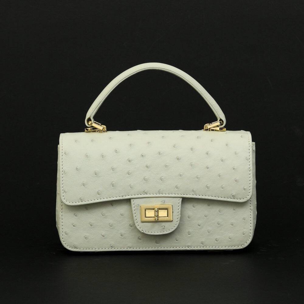 Rossie Viren women's ostrich leather mini flap chain handbag with top handle and crossbody strap, showcasing a sleek, stylish design.