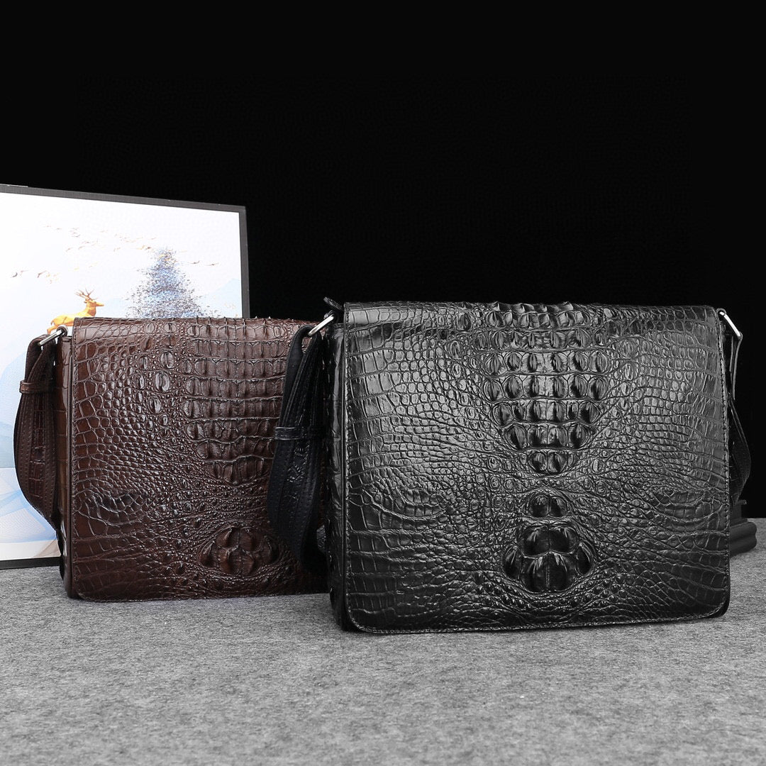 Genuine crocodile leather Rossie Viren postal messenger handbag with adjustable strap and classic design on a white background.