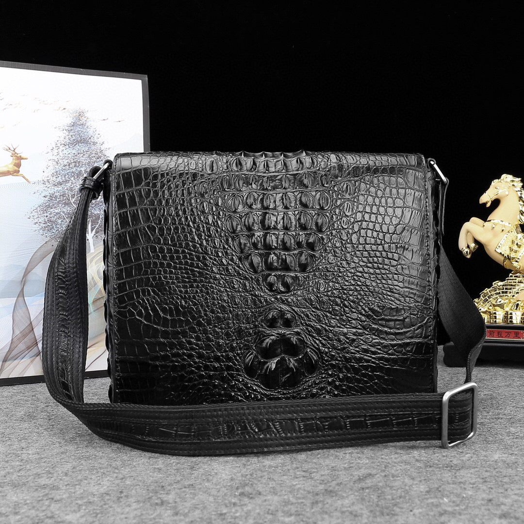 Genuine crocodile leather postal messenger bag by Rossie Viren, stylish handbag with textured crocodile pattern and adjustable strap.