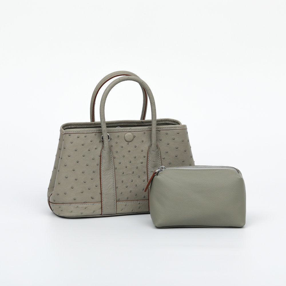 Genuine ostrich skin leather small tote bag by Rossie Viren, stylish handbag with textured black finish.