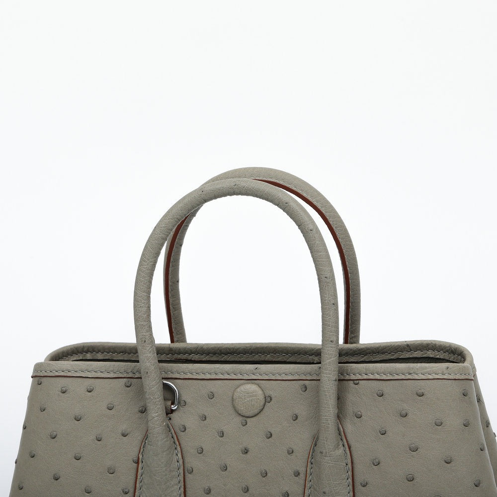 Genuine ostrich skin leather small tote bag by Rossie Viren, stylish handbag with textured black leather and sturdy handles.