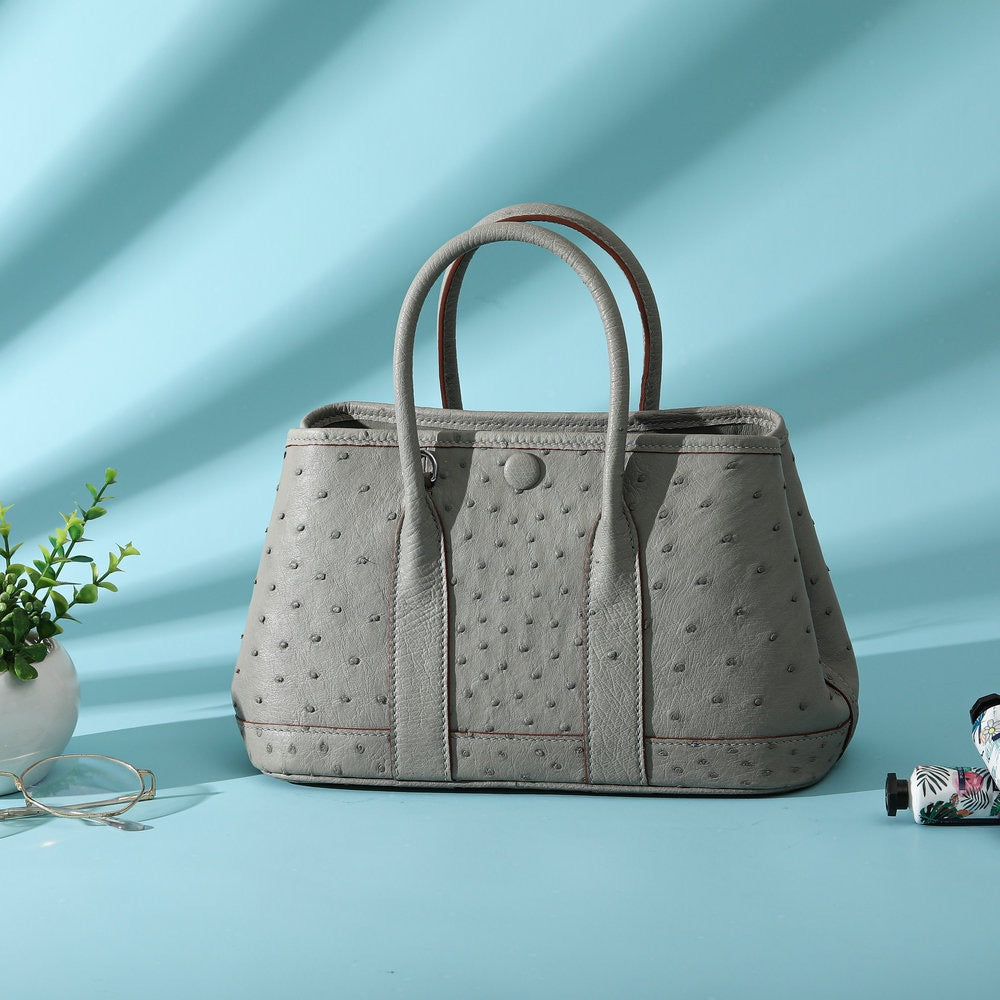 Genuine ostrich skin leather small tote bag by Rossie Viren, featuring a sleek handbag design with textured leather finish.