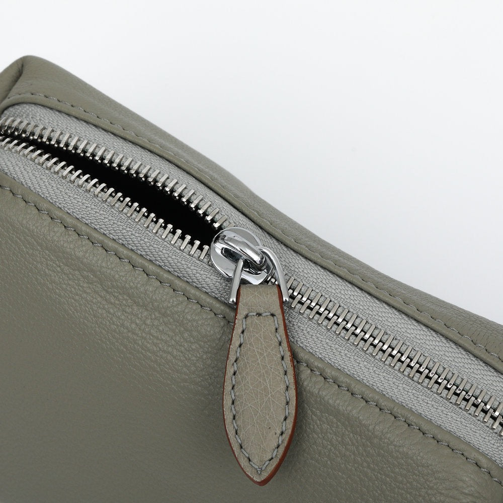 Genuine ostrich skin leather small tote bag by Rossie Viren with top handles and textured surface for stylish carry.
