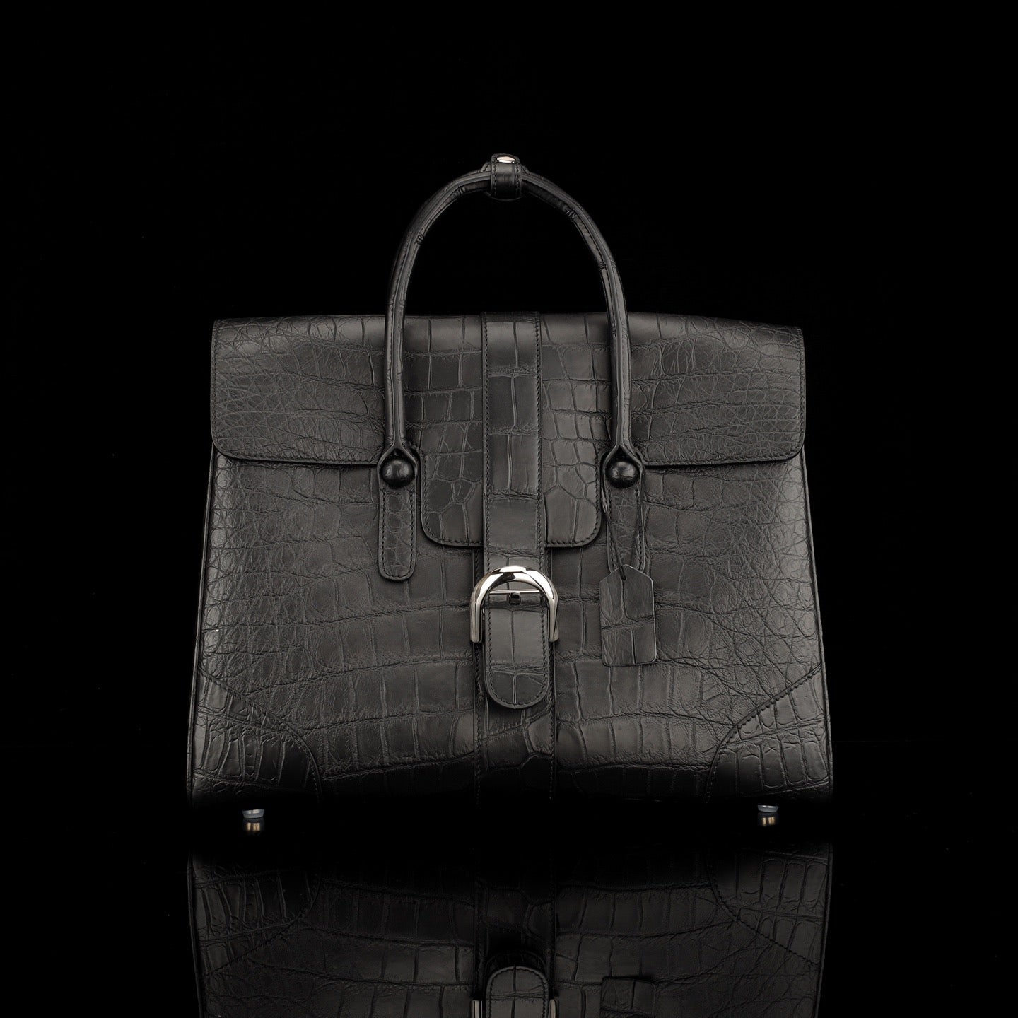 Black crocodile leather briefcase from Rossie Viren with sleek design and sturdy handle, perfect for professional use.