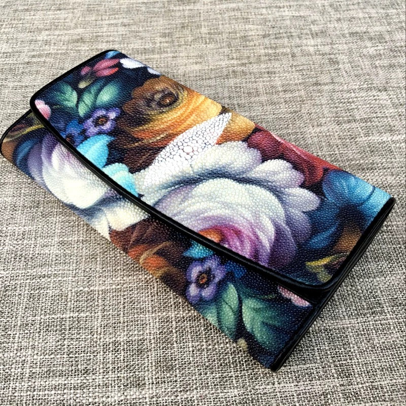 Genuine stingray TriFold wallet with floral design for women by Rossie Viren, showing textured stingray leather and colorful floral accents.