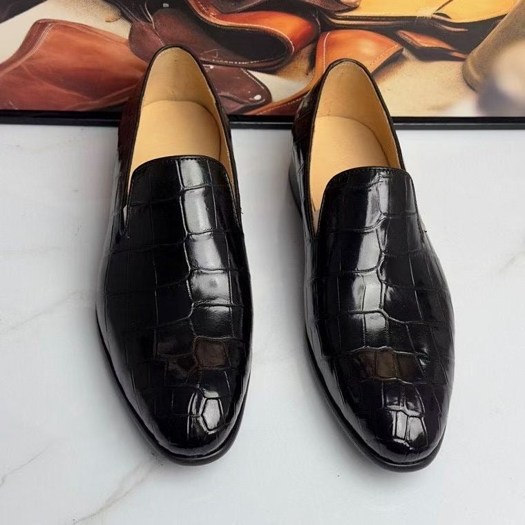 Black genuine crocodile leather slip-on loafers by Rossie Viren featuring a sleek, polished design and classic loafer style.