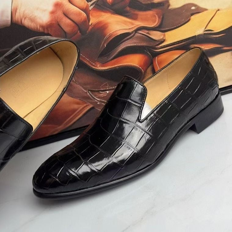 Black genuine crocodile leather slip-on loafers by Rossie Viren, showcasing sleek, textured crocodile pattern shoes.