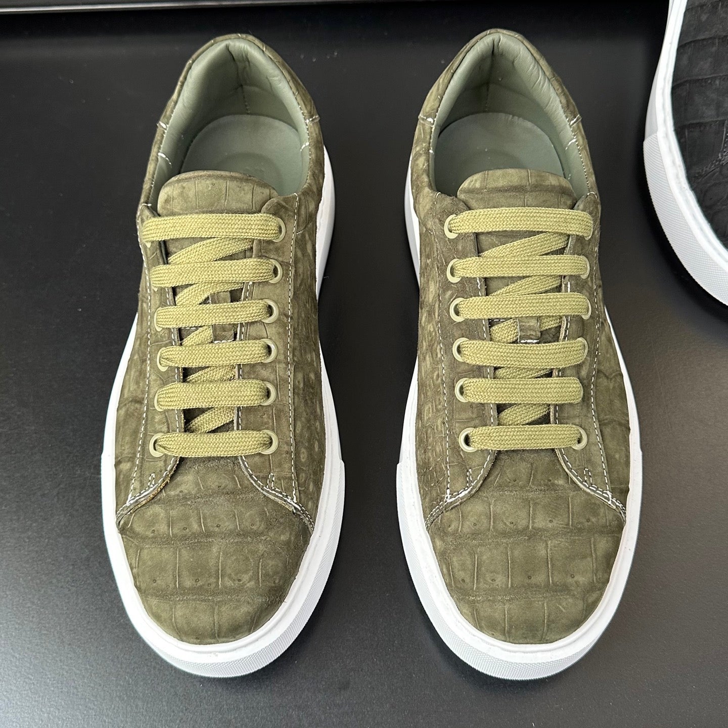 Green Rossie Viren Crocodile Sneakers made of genuine nubuck crocodile leather, stylish shoes with textured leather details.
