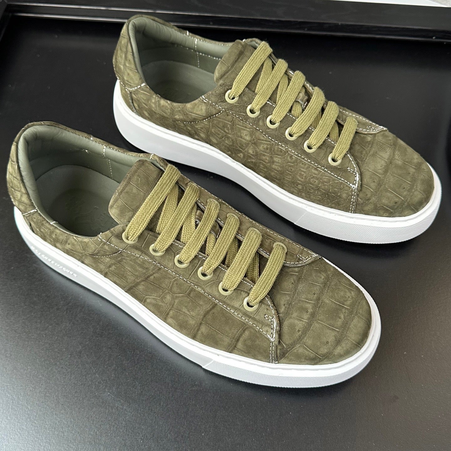Green Rossie Viren Crocodile Sneakers with nubuck genuine crocodile leather, showcasing stylish shoes with intricate leather details.
