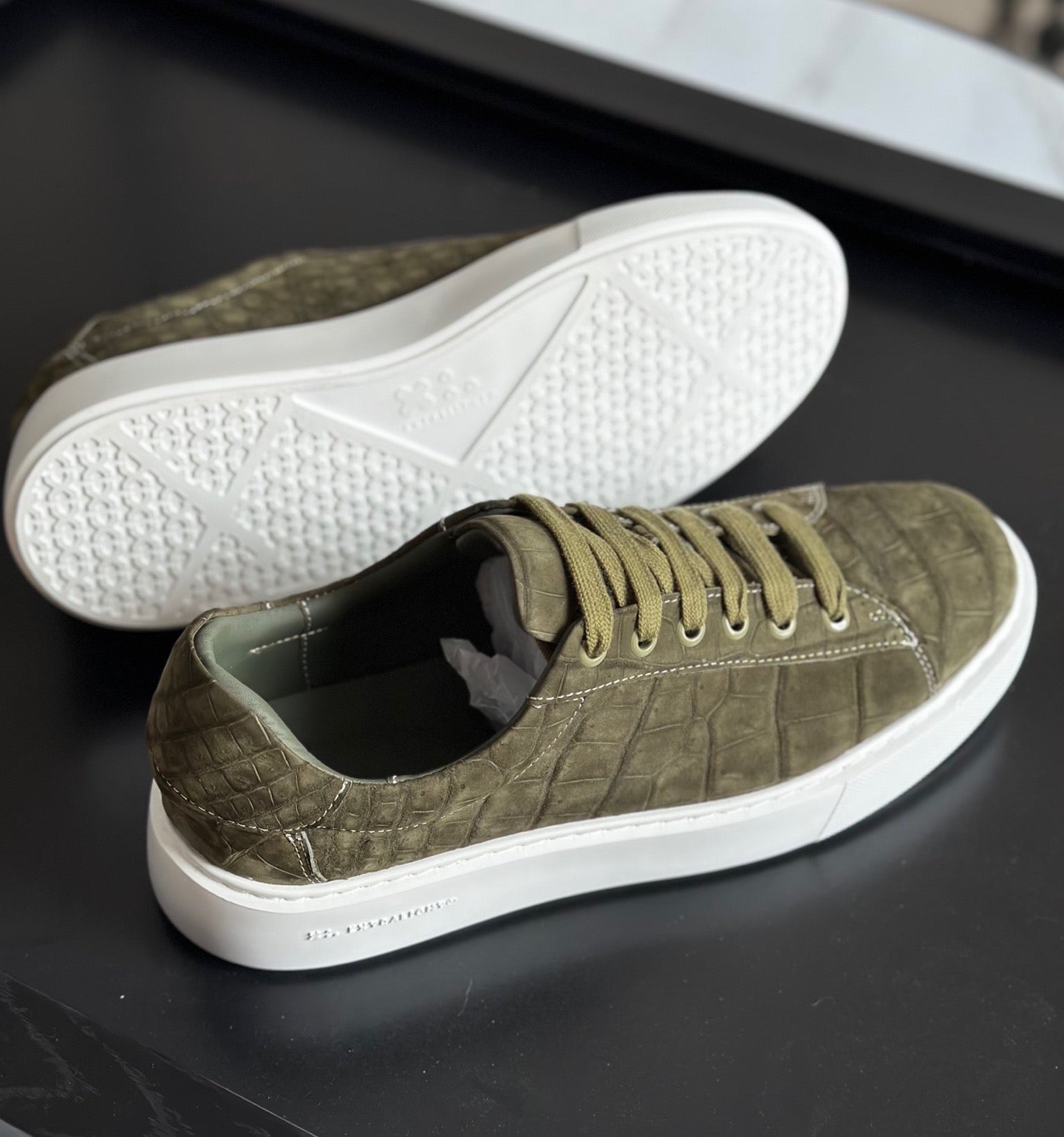 Green Rossie Viren Crocodile Sneakers made from genuine nubuck crocodile leather with a stylish shoe design.