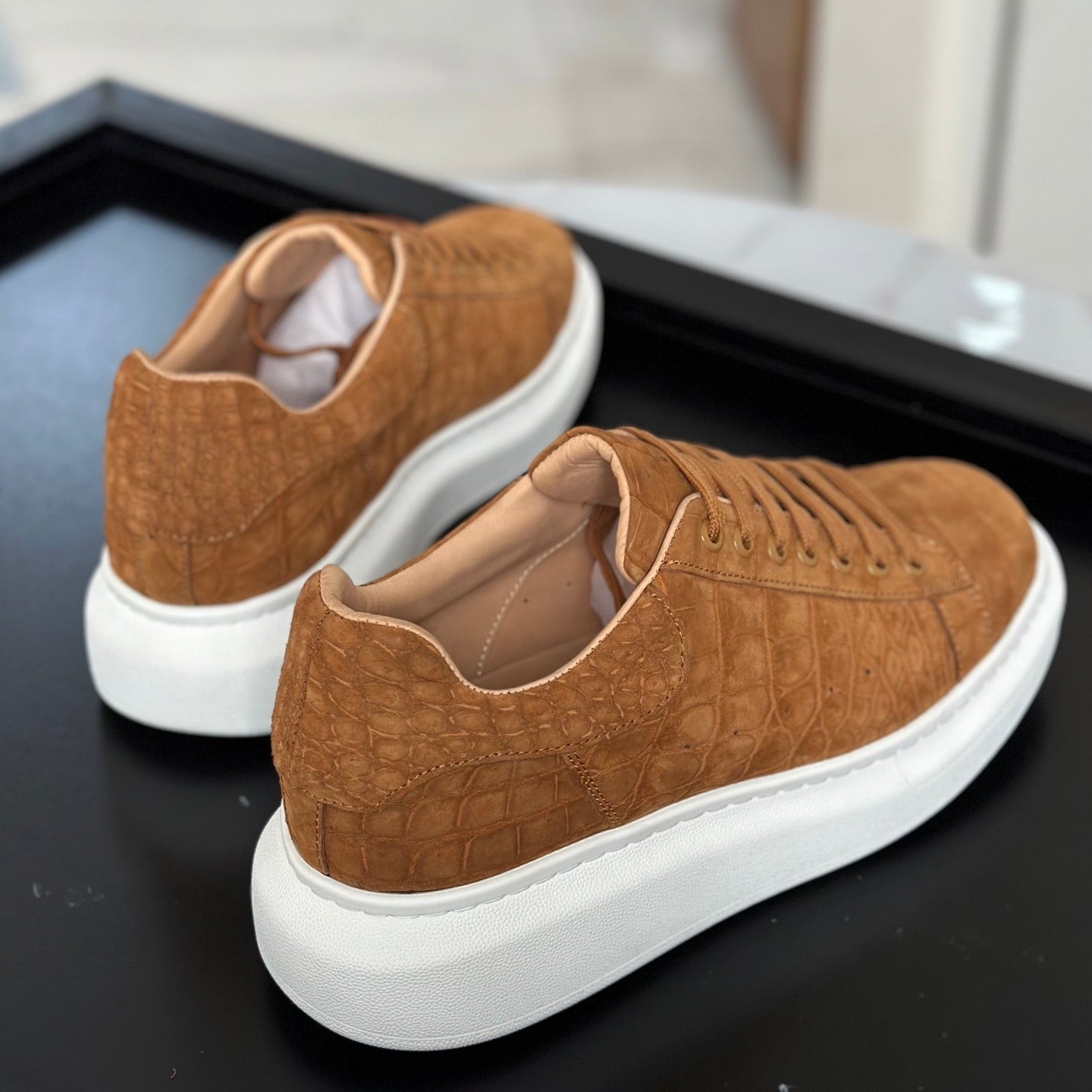 Tan Rossie Viren crocodile sneakers made from genuine nubuck crocodile leather, featuring a stylish and durable shoe design.
