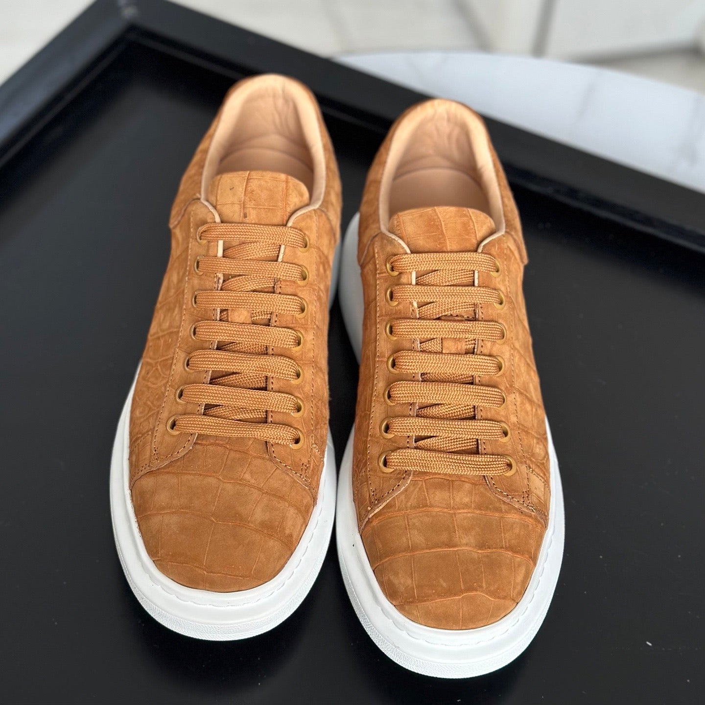 Tan Rossie Viren crocodile sneakers made from genuine nubuck crocodile leather, showcasing stylish shoe design with textured leather.