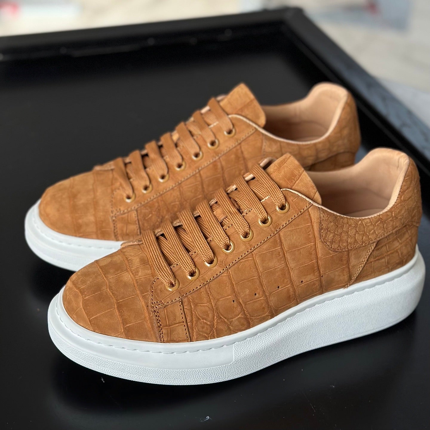 Tan Rossie Viren Crocodile Sneakers made from genuine nubuck crocodile leather, featuring a stylish and textured shoe design.