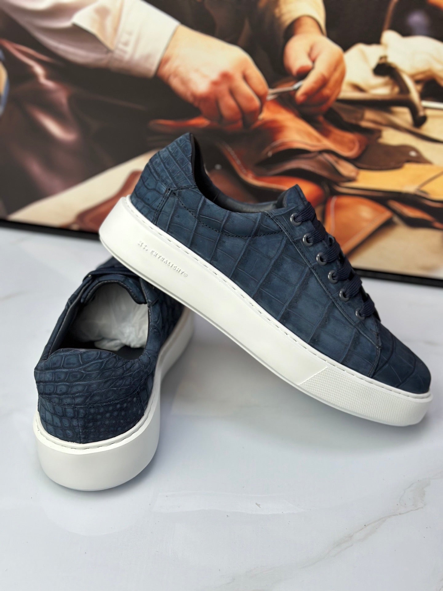 Dark blue Rossie Viren Crocodile Sneakers made from genuine nubuck crocodile leather, showcasing stylish and luxurious footwear.