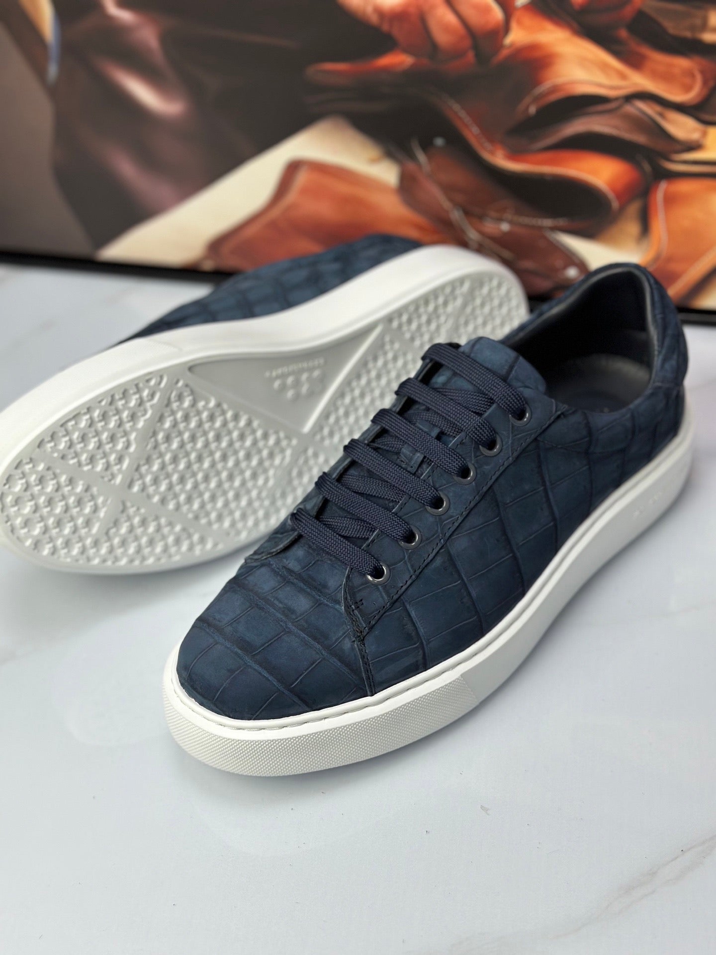 Dark blue Rossie Viren crocodile sneakers made from genuine nubuck crocodile leather, showcasing stylish and luxurious footwear.