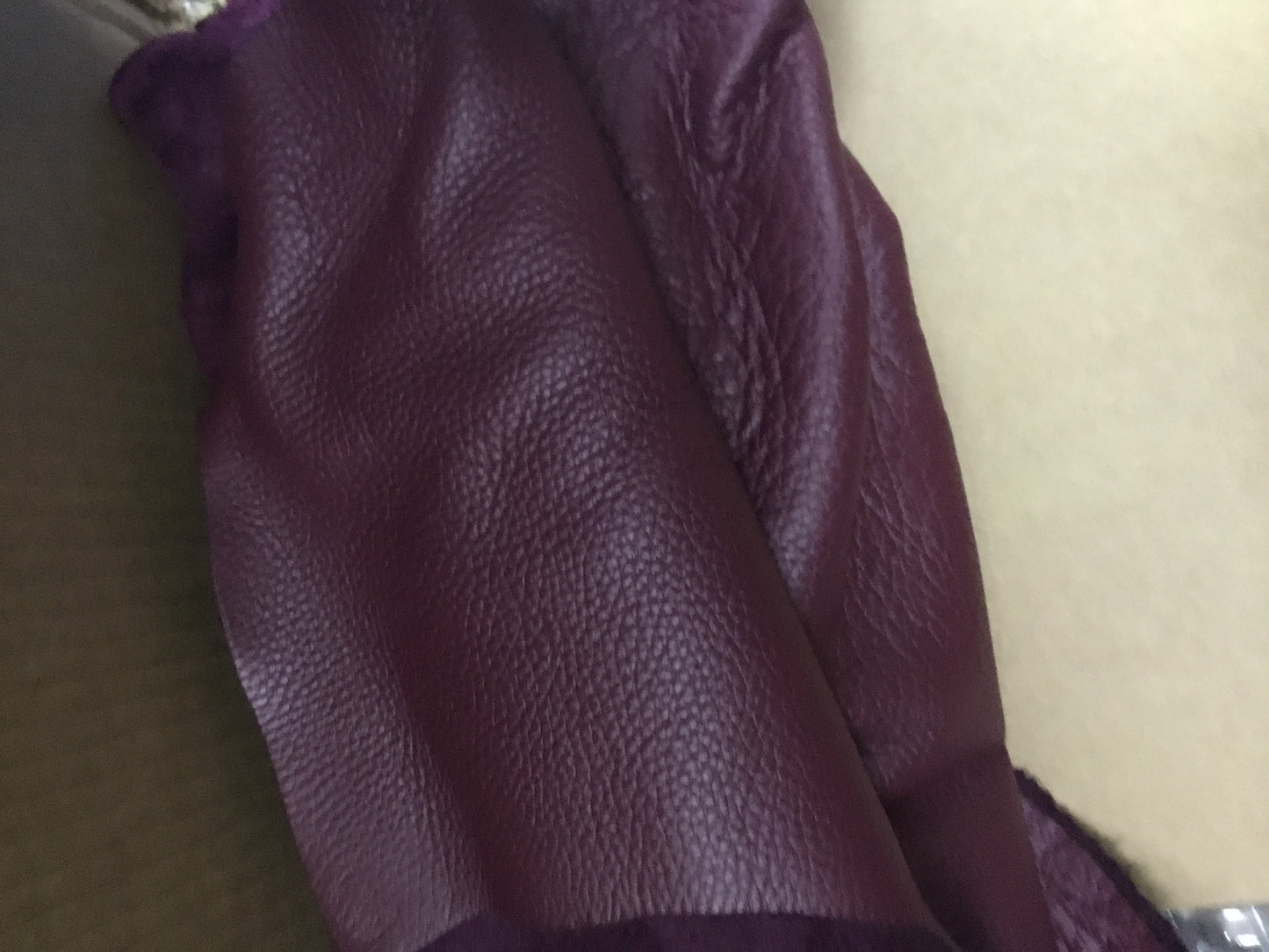 Rossie Viren wine red calfskin leather handbag with large size, sturdy handle, and a padlock for business travel and office use.