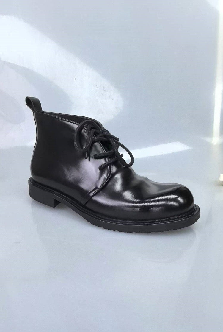 Genuine Shell Cordovan leather short lace-up Martin boots by Rossie Viren, featuring a sleek design and sturdy leather construction.